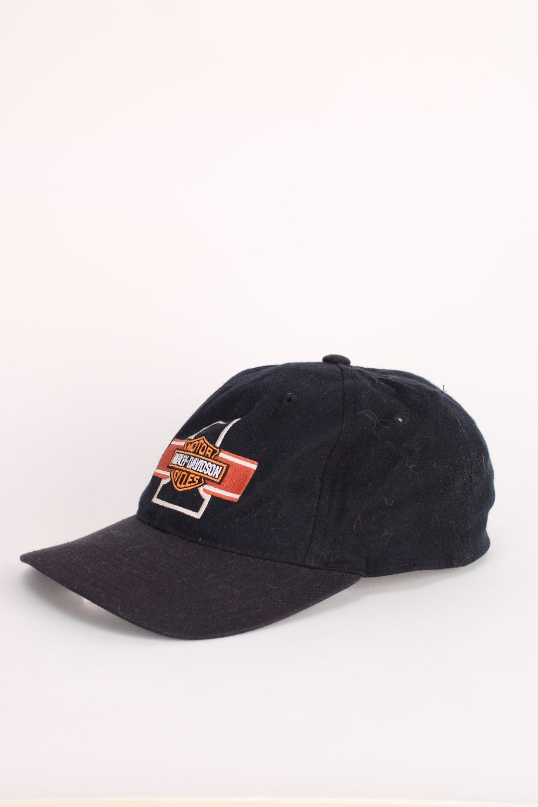 Vintage Harley-Davidson Cap in a black colourway with the logo and graphic embroidered on the front, elasticated hem.