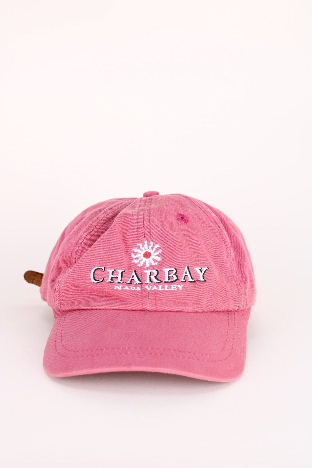 Vintage Napa Valley Cap in a pink colourway with the spell out 'Charbay, Napa Valley' embroidered on the front, and has an adjustable strap.