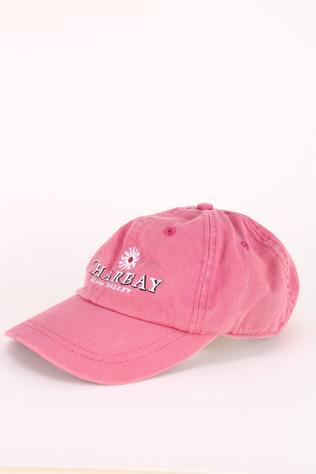 Vintage Napa Valley Cap in a pink colourway with the spell out 'Charbay, Napa Valley' embroidered on the front, and has an adjustable strap.