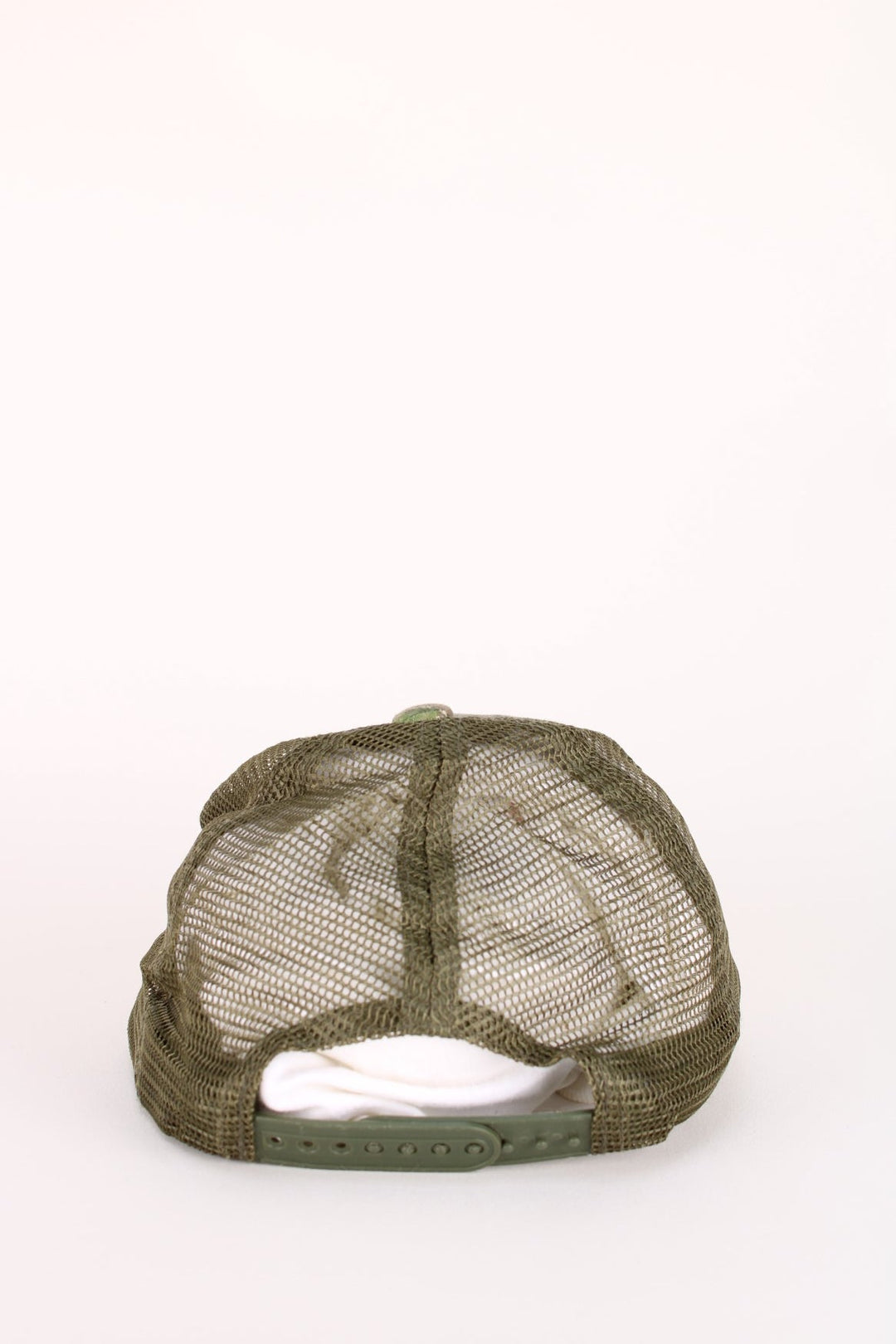 Vintage Bass Pro Shops Camo Cap in a green and brown colourway with the logo embroidered on the front, and has an adjustable snapback.