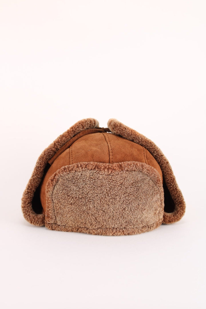 Vintage Trapper Hat in a brown colourway with a fleece lining, and tie up option.