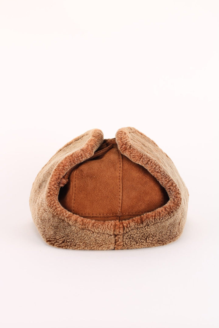 Vintage Trapper Hat in a brown colourway with a fleece lining, and tie up option.