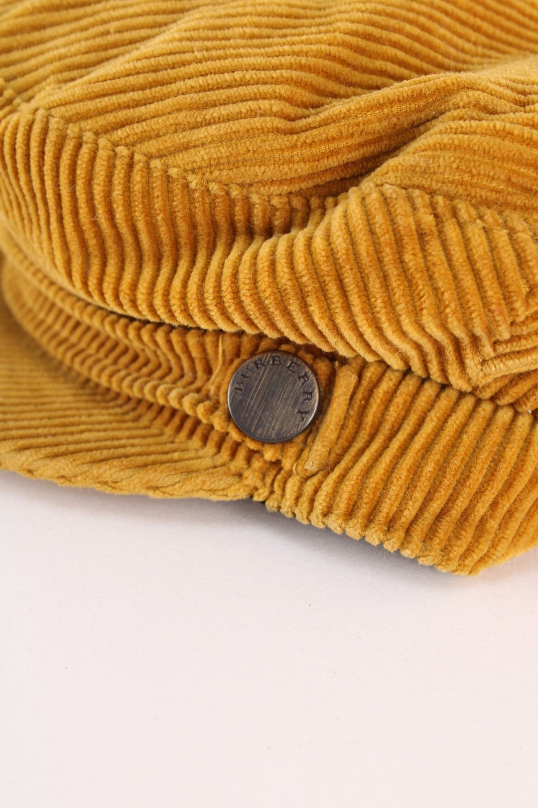 Vintage Burberry Corduroy Baker Boy Hat in a tan colourway.