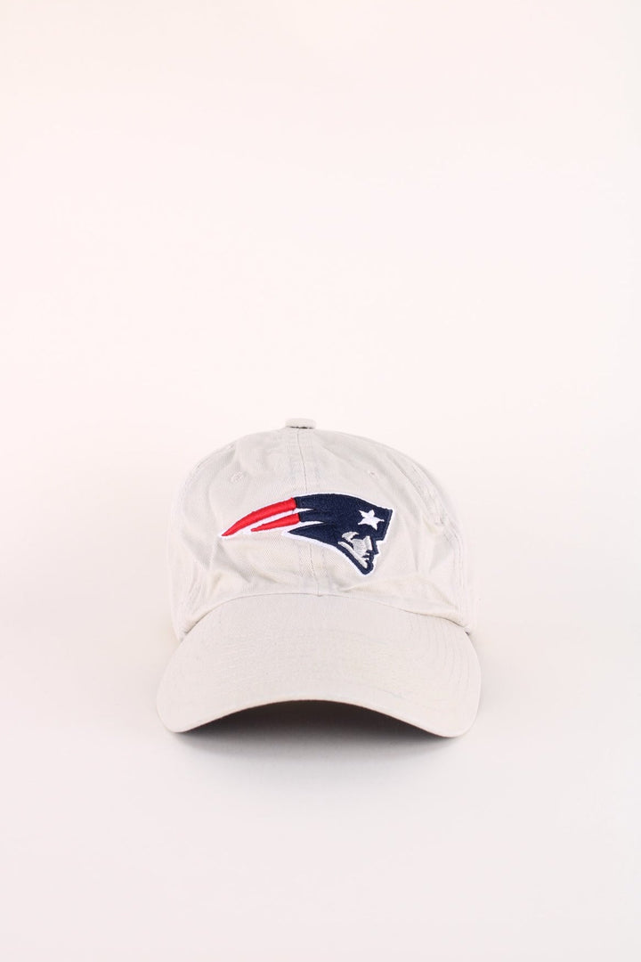 New England Patriots NFL Cap in a grey colourway with the team logo embroidered on the front, and has an adjustable strap.