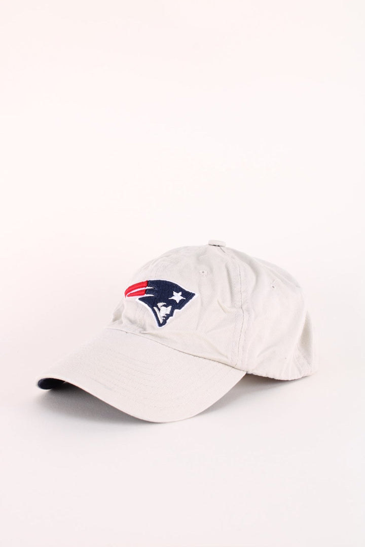 New England Patriots NFL Cap in a grey colourway with the team logo embroidered on the front, and has an adjustable strap.