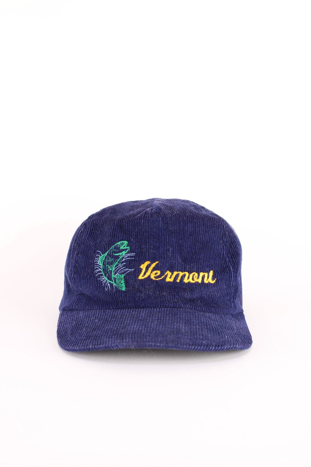 Vintage Vermont Corduroy Trucker Cap in a blue colourway with the logo and fish graphic printed on the front, and has an adjustable snapback.