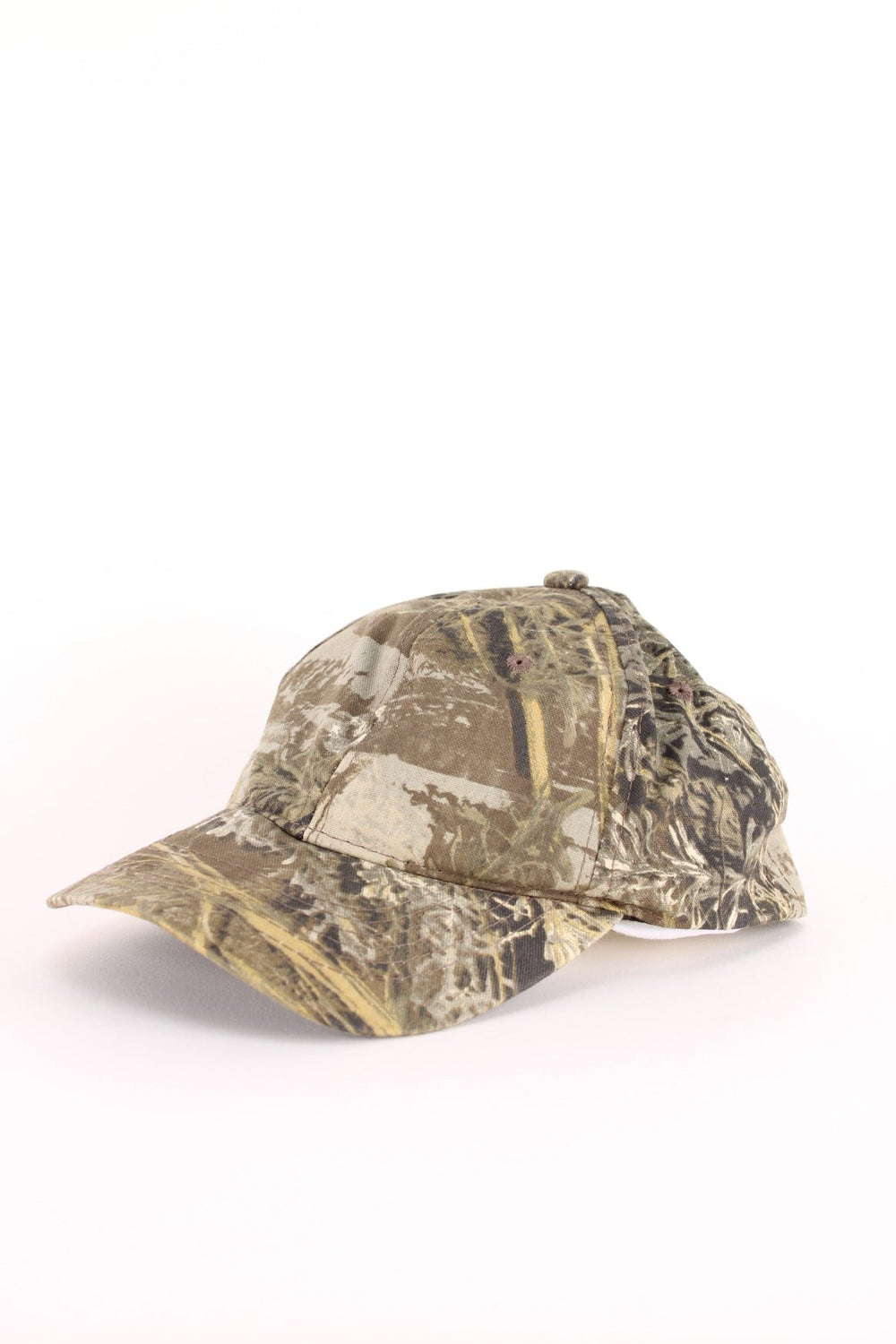 Vintage Real Tree Camo Cap in a green and brown colourway and has an adjustable velcro strap.