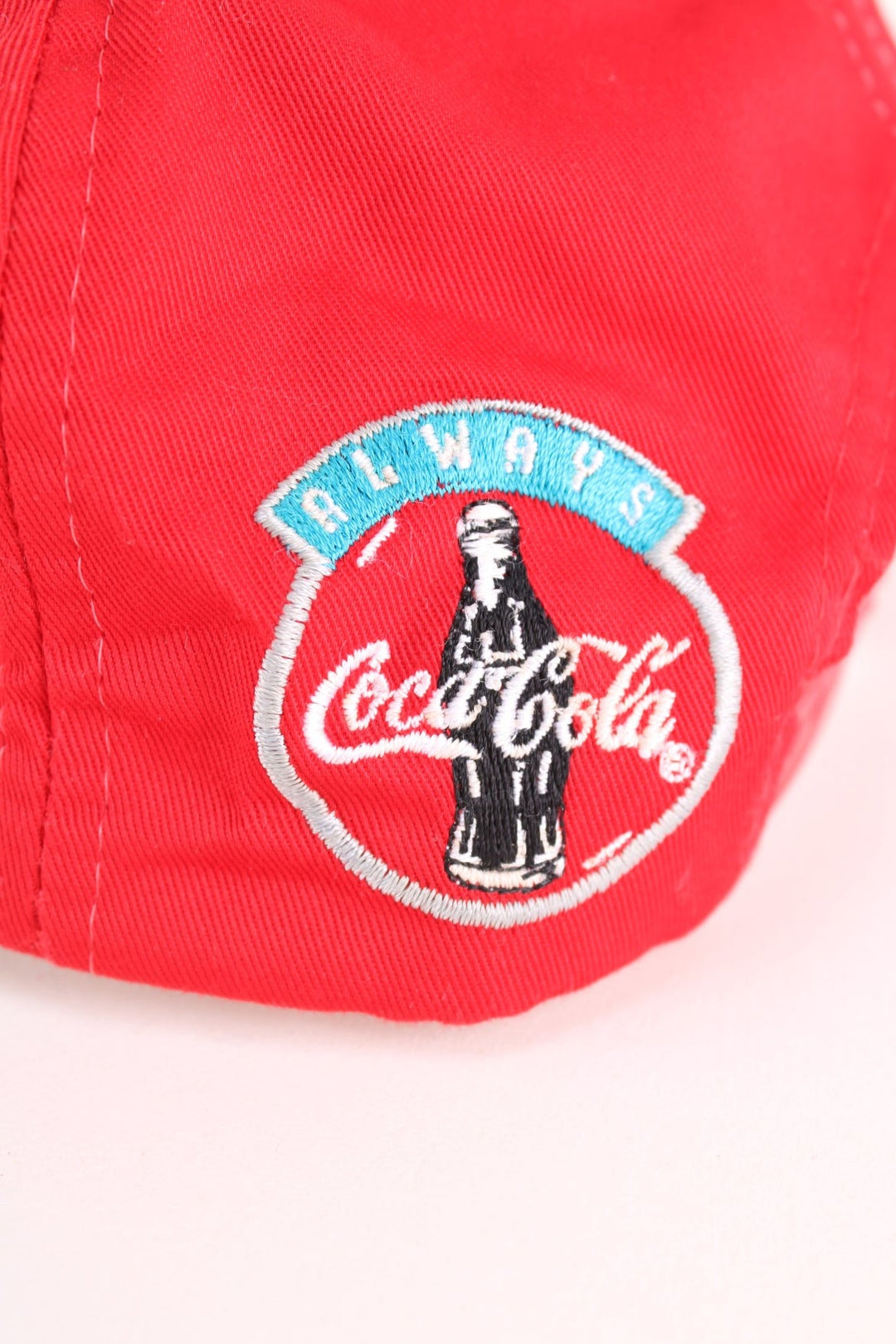 Vintage 90's Coca Cola Red Hot Summer Cap in a red colourway with the spell out and logo embroidered all over, and has a adjustable snapback.