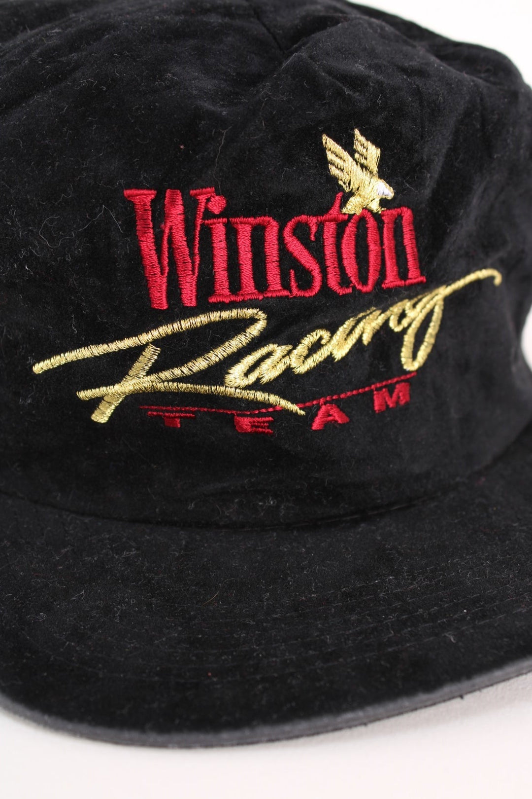 Vintage 80's Winston Racing Team Cap in a black colourway with the spell out logo embroidered on the front, and has a adjustable snapback.