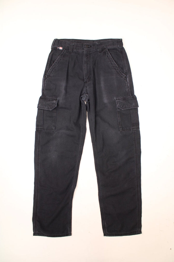 Carhartt Cargo Trousers in a black colourway with multiple pockets and the logo embroidered on the back.