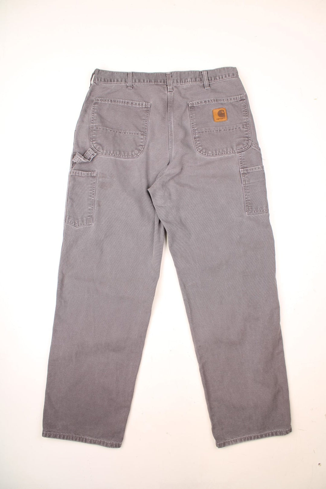 Carhartt Carpenter Jeans in a grey colourway with multiple pockets and the logo embroidered on the back. 