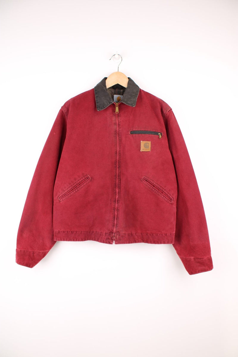 Carhartt J97 CRI Detroit Jacket an extremely rare crimson red colourway, produced for only a short time period for this is jacket is like no other, zip up with multiple pockets, blanket lining, and has the logo embroidered on the front. 