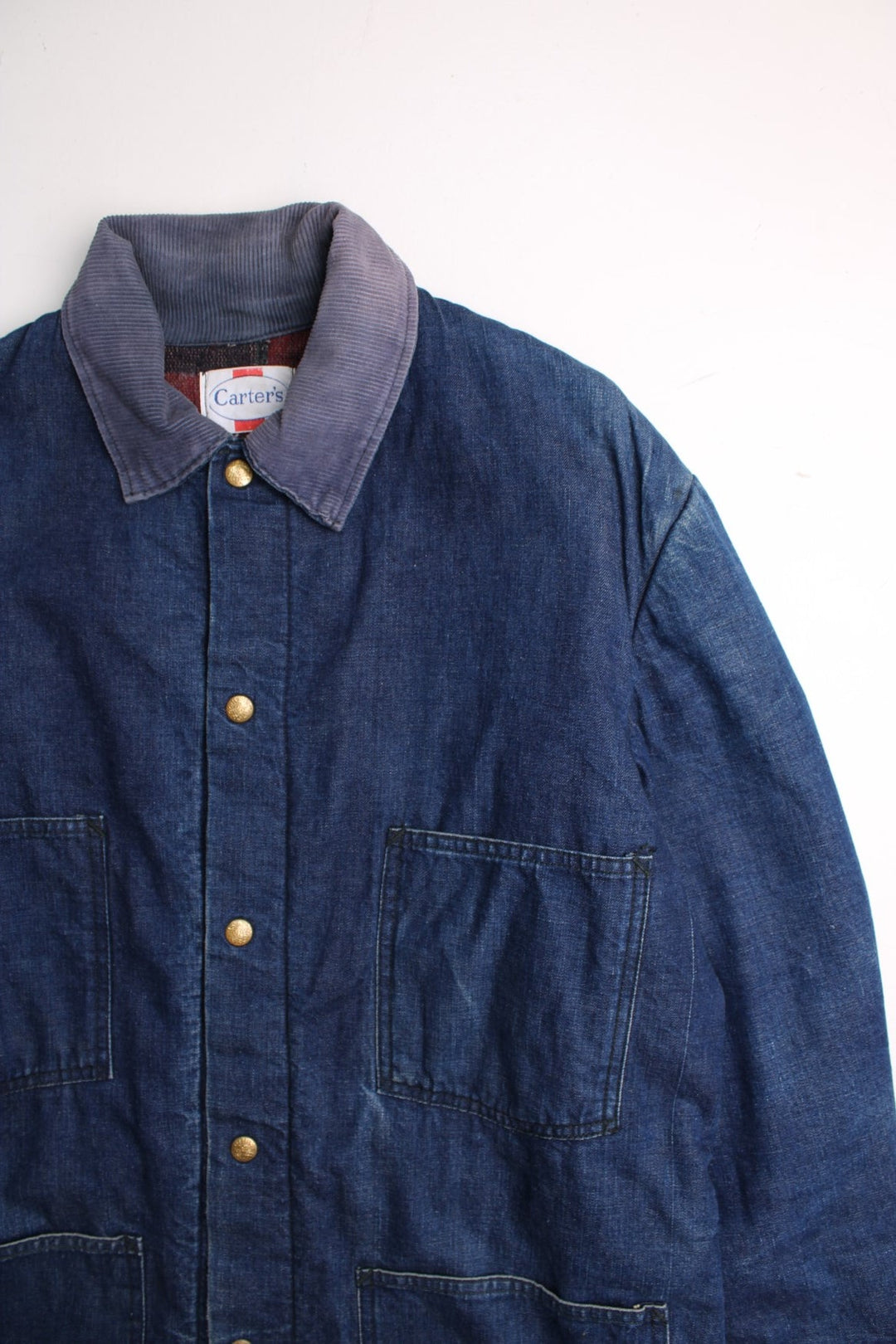 Vintage Carters Chore Workwear Jacket in a blue colourway. Buttons up and has multiple pockets, insulated with a blanket lining, and has a corduroy collar.