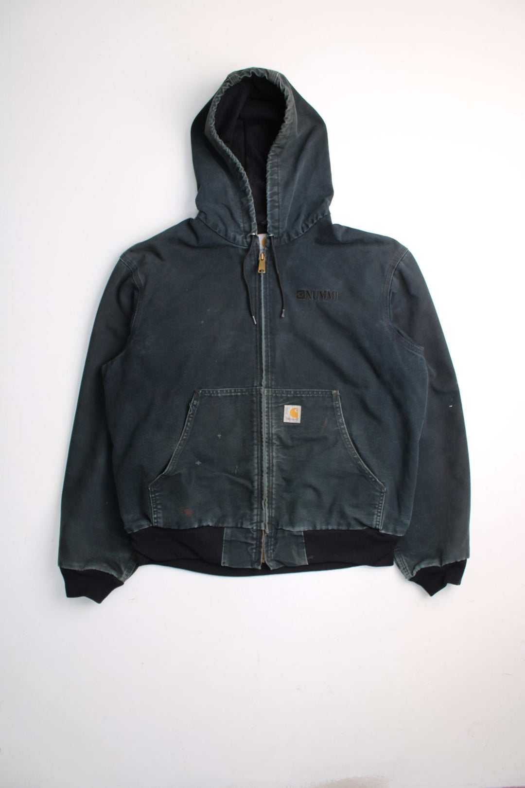 Carhartt Active Jacket in a black colourway. Zips up and has side pockets, hooded, has 'Nummi' business spell out logo embroidered on the front and Carhartt logo embroidered on the pocket.