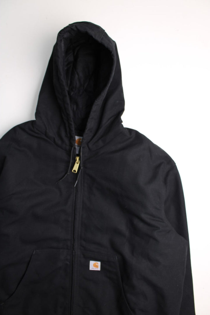 Carhartt Active Jacket in a black colourway. Zips up and has side pockets, hooded, and has the logo embroidered on the front.