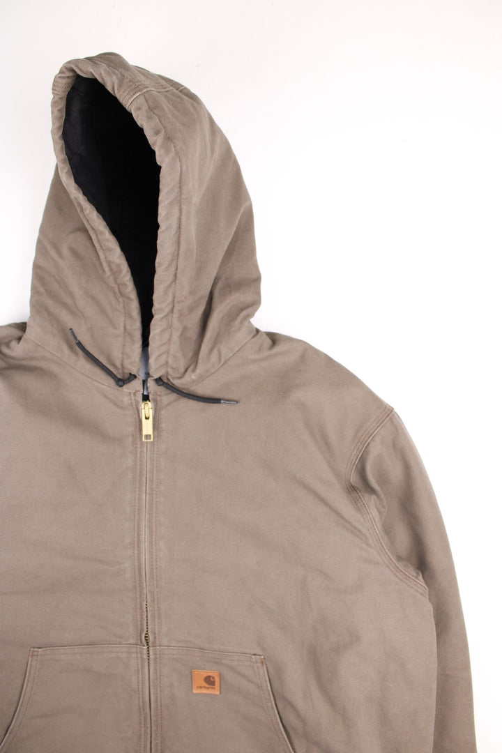 Carhartt Active Jacket in a brown colourway. Zips up and has side pockets, hooded, and has the logo embroidered on the front.