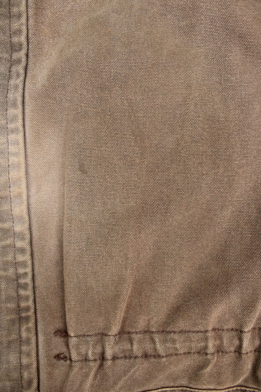 Carhartt Barn Chore Jacket in a brown colourway. Zip and button up with side pockets, corduroy collar, and has the logo embroidered on the front.