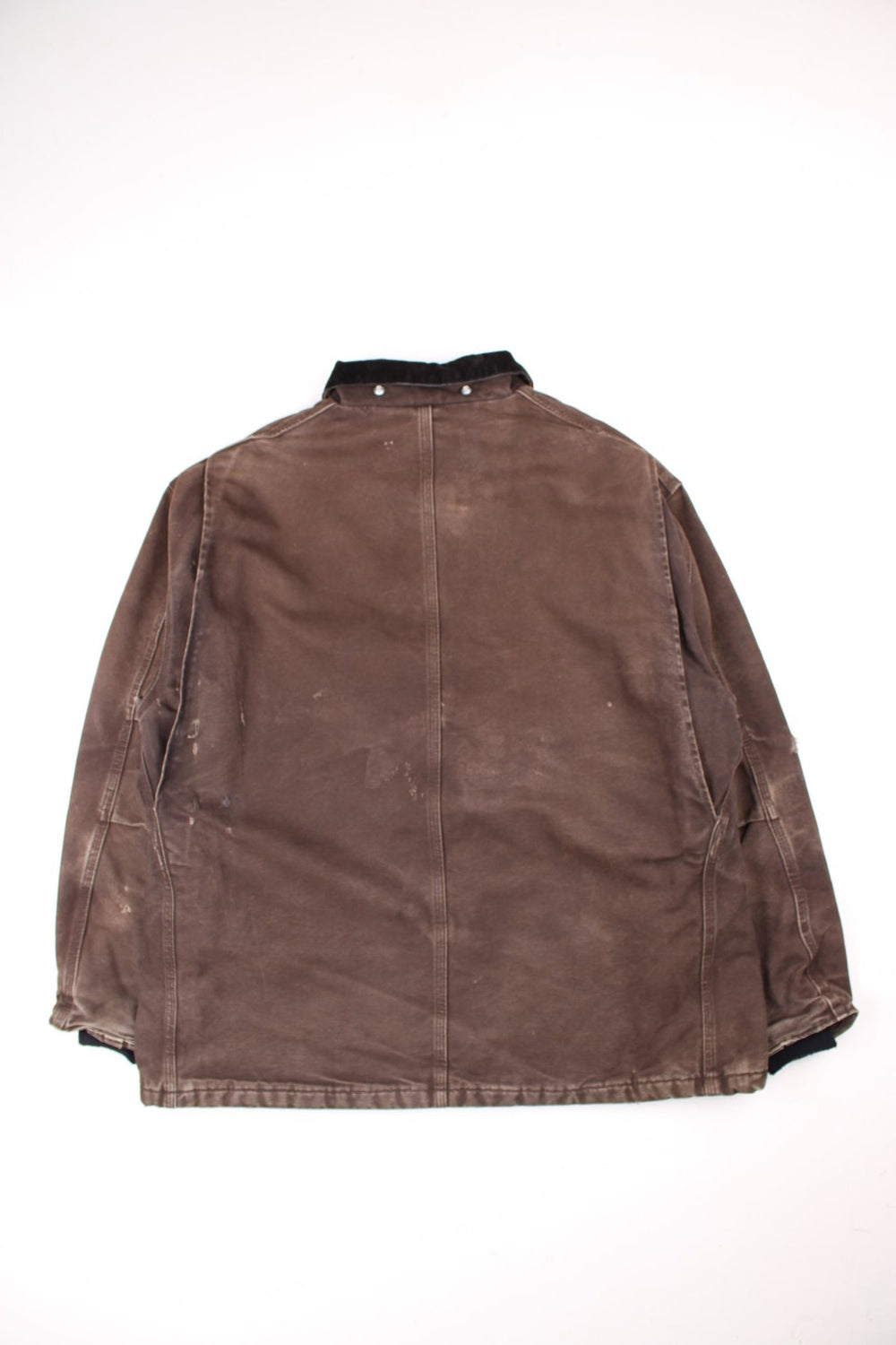 Carhartt Arctic Jacket in a brown colourway. Zips up and has multiple pockets, insulated with a quilted lining, corduroy collar, and has the logo embroidered on the front.