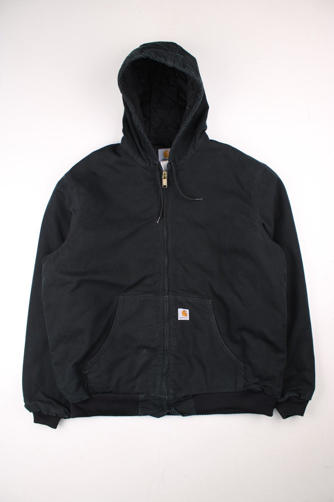 Carhartt Active Jacket in a black colourway. Zips up and has side pockets, hooded, and has the logo embroidered on the front.