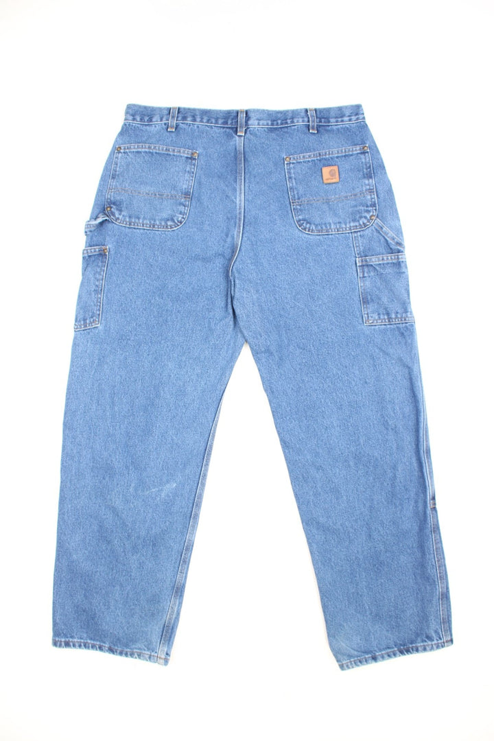 Carhartt double knee jeans with multiple pockets and the logo embroidered on the back.