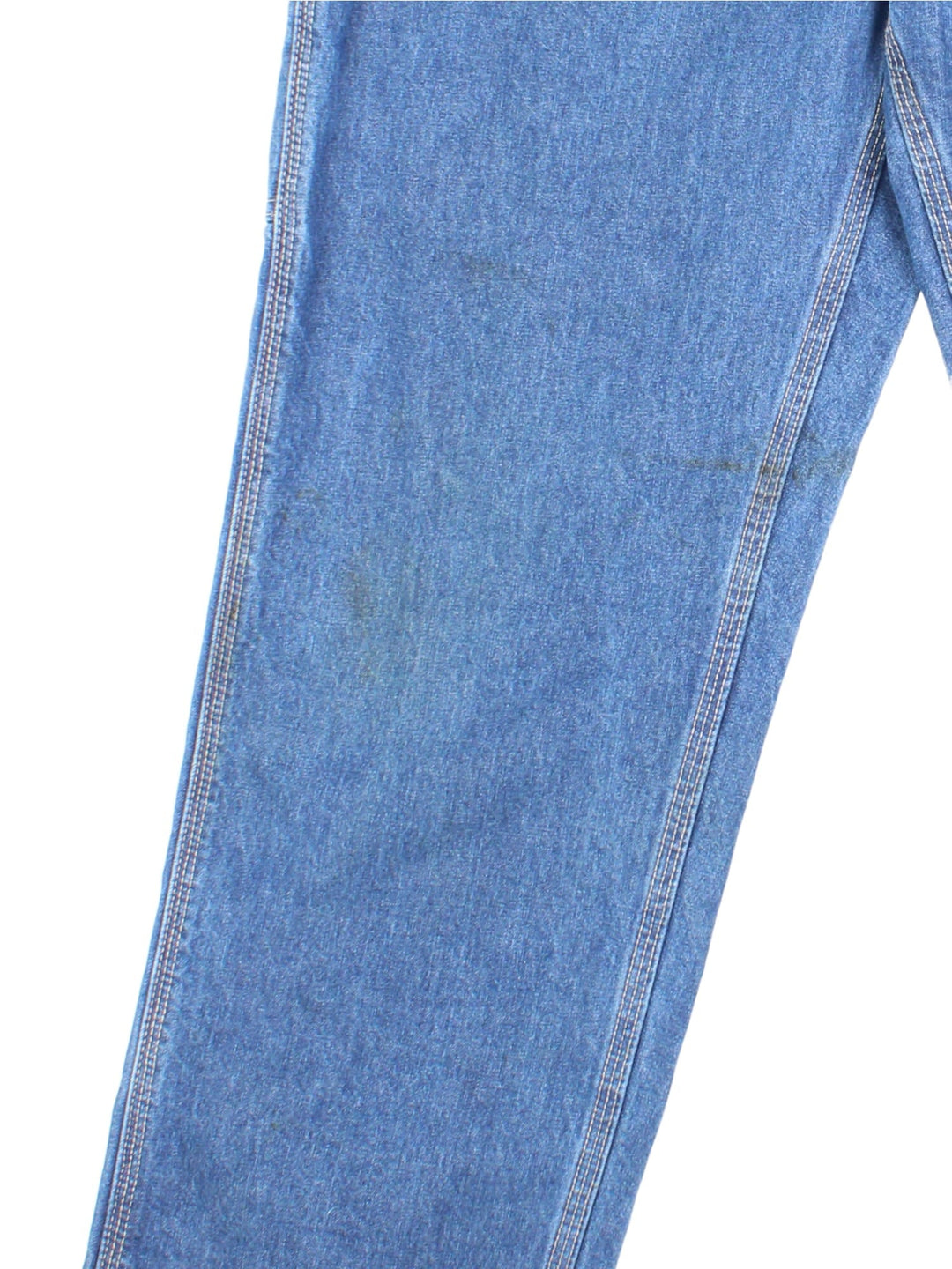 Carhartt Carpenter Jeans in a blue colourway with multiple pockets and the logo embroidered on the back.