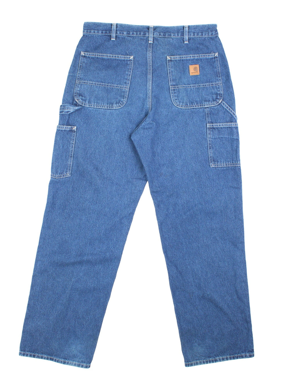 Carhartt Carpenter Jeans in a blue colourway with multiple pockets and the logo embroidered on the back.