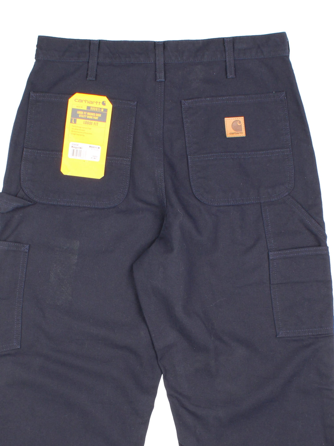 Carhartt Carpenter Jeans in a navy blue colourway with multiple pockets and the logo embroidered on the back, new with tags still on.