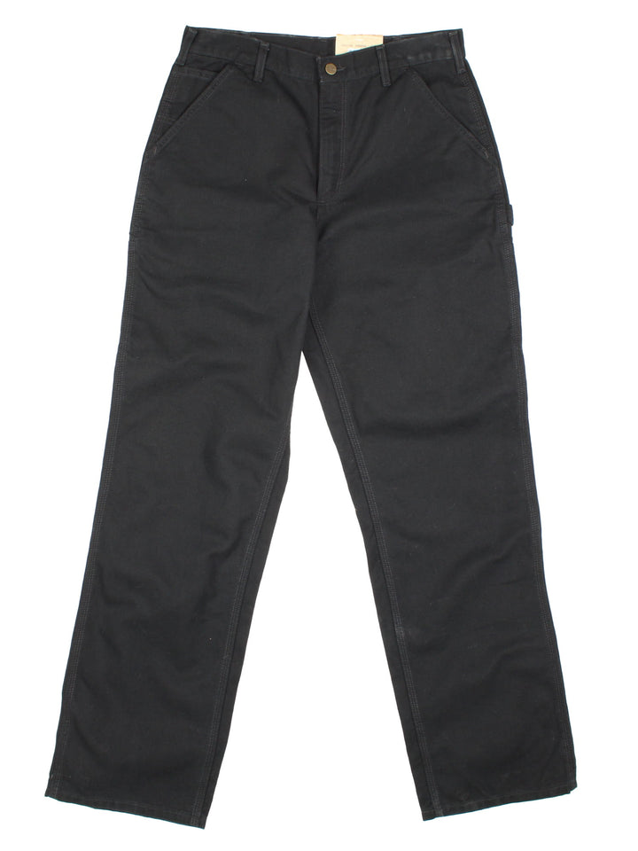 Carhartt Carpenter Jeans in a black colourway with multiple pockets and the logo embroidered on the back, new with tags still on.