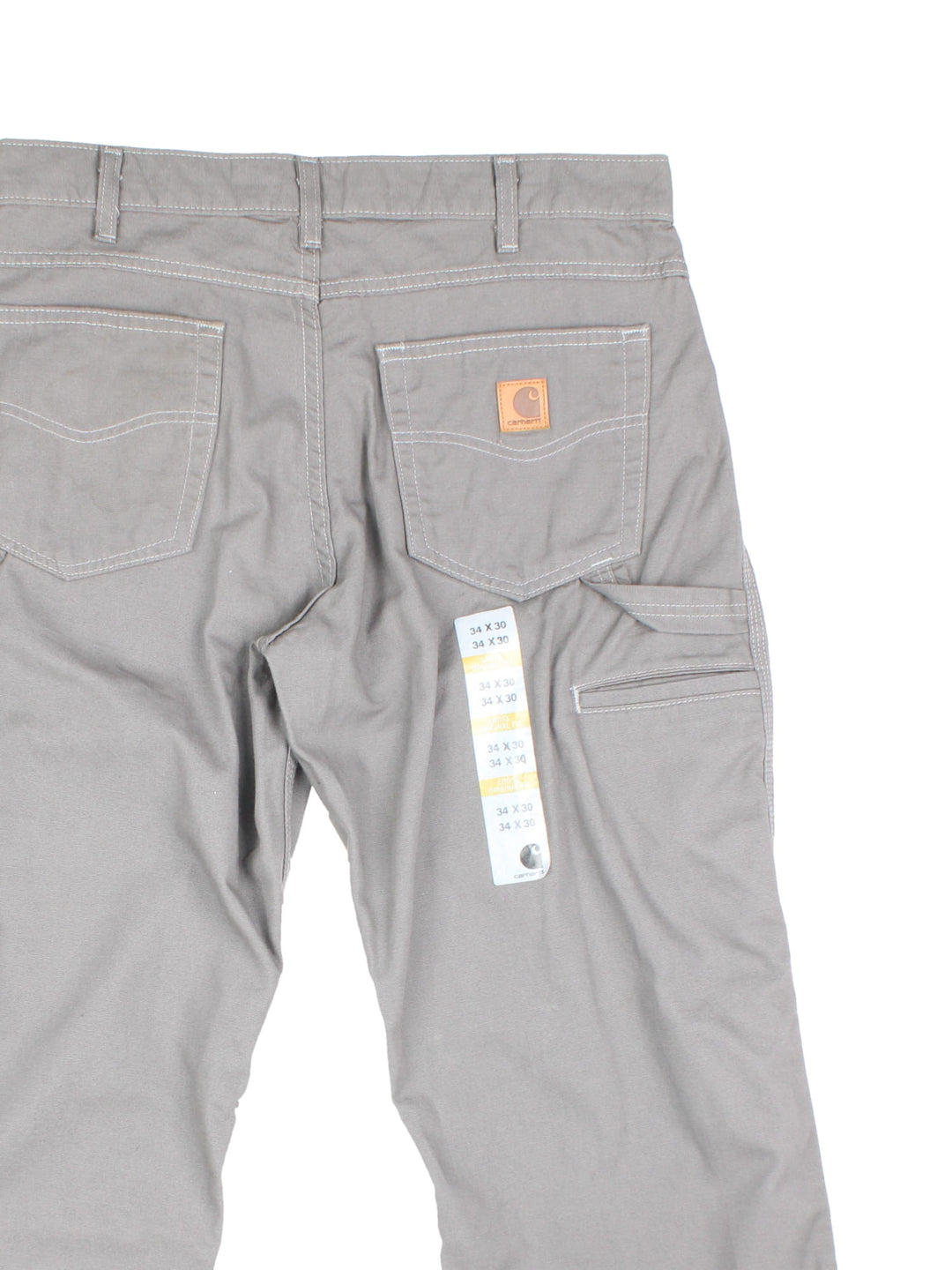 Carhartt Carpenter Jeans in a grey colourway with multiple pockets and the logo embroidered on the back, new with the tags still on.