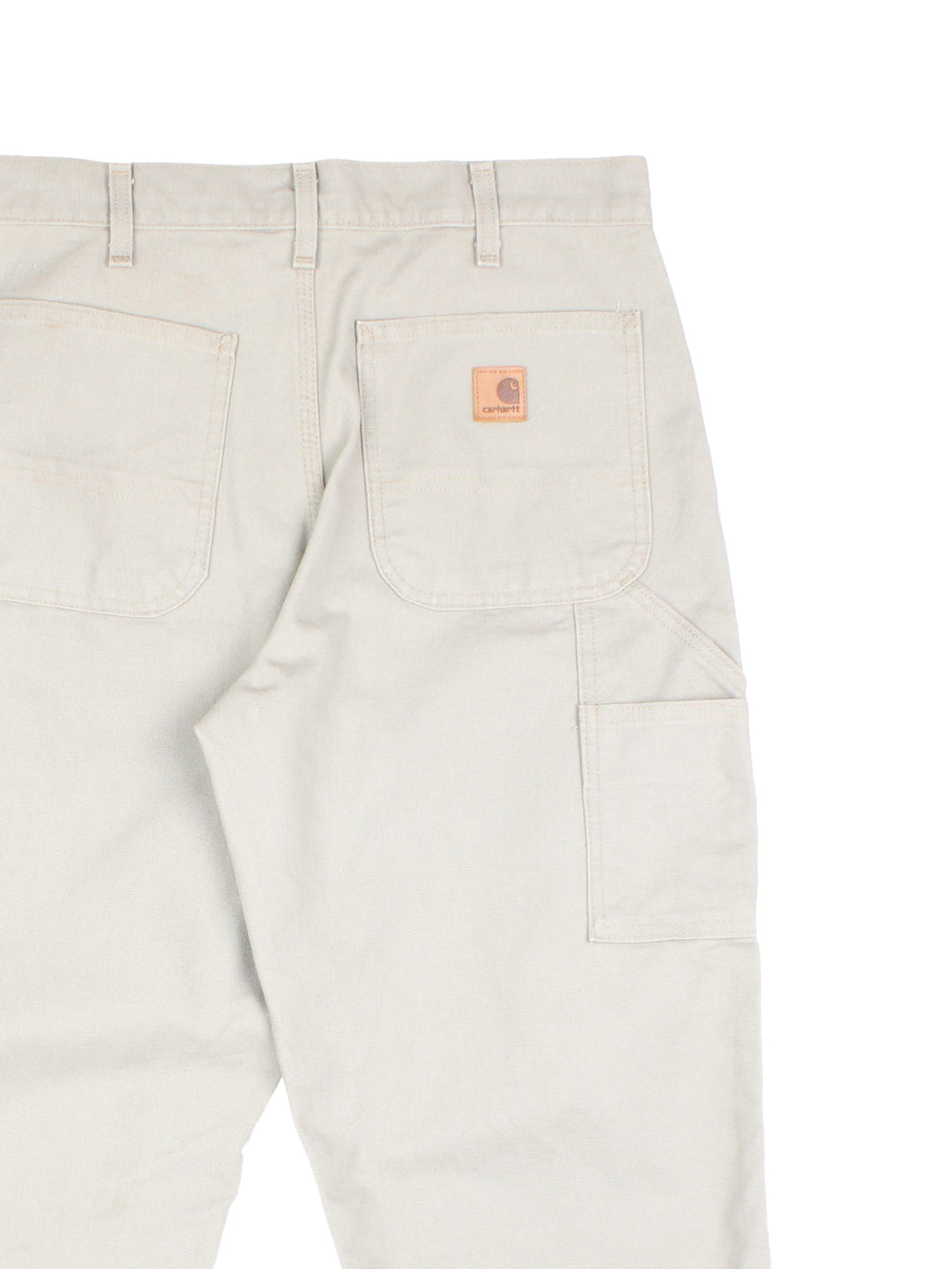 Carhartt Carpenter Jeans in a desert tan colourway with multiple pockets and the logo embroidered on the back.