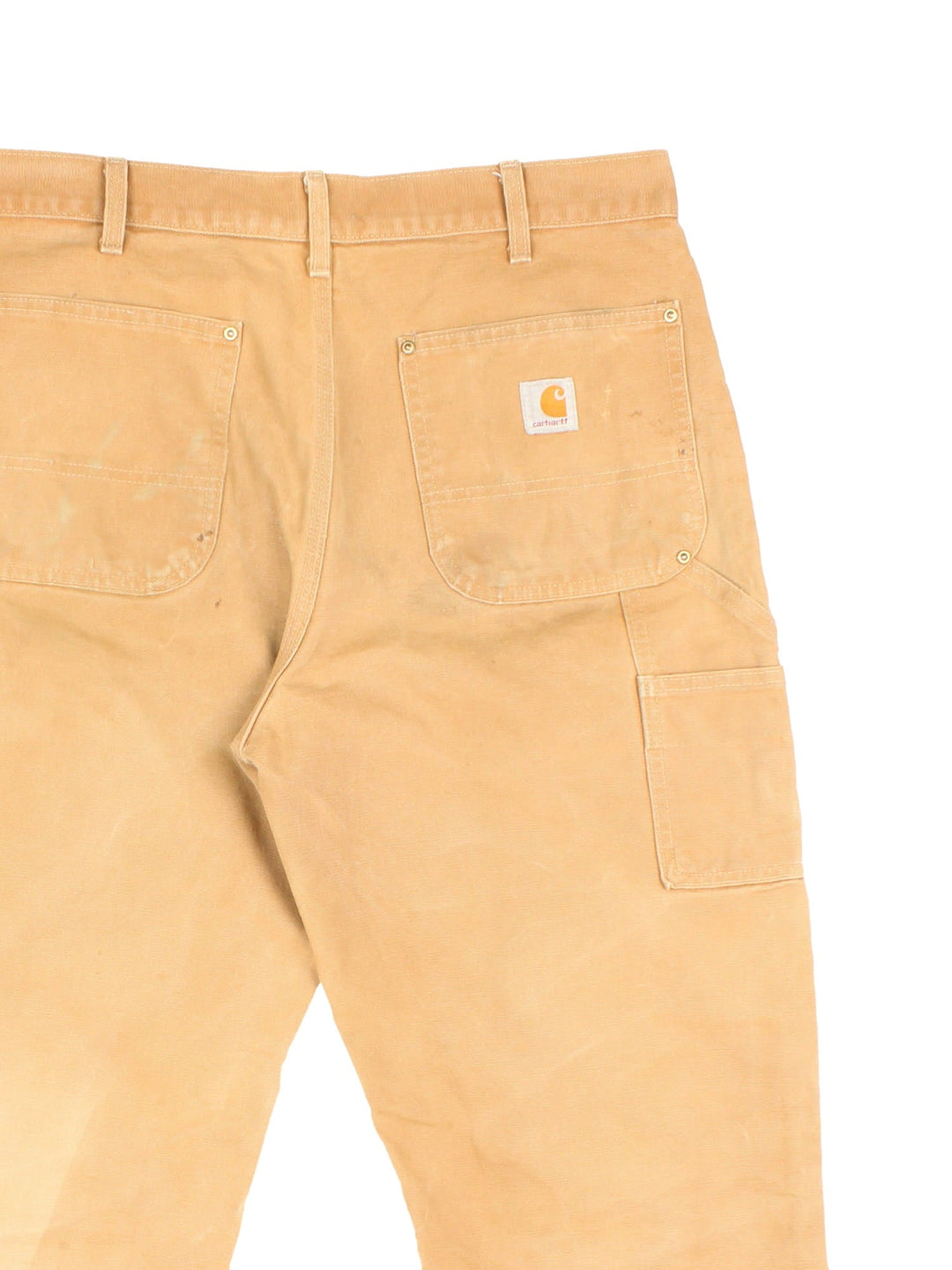 Carhartt Double Knee Jeans in a tan colourway with multiple pockets and the logo embroidered on the back.