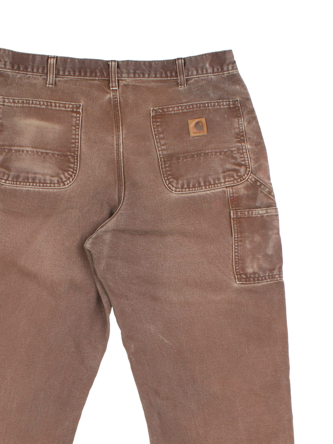 Carhartt Carpenter Jeans in a brown colourway with multiple pockets and the logo embroidered on the back.