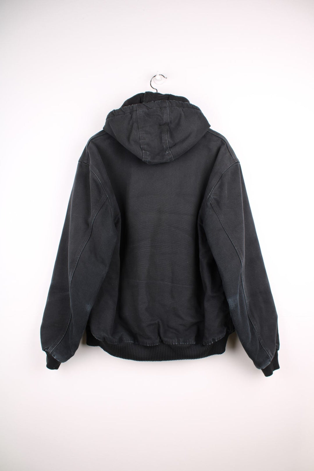 Carhartt Active Jacket in a black colourway, zips up and has side pockets, hooded and the logo embroidered on the front.