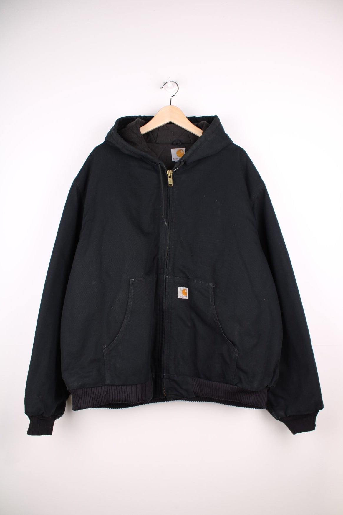 Carhartt Active Jacket in a black colourway, zips up and has side pockets, hooded and the logo embroidered on the front.