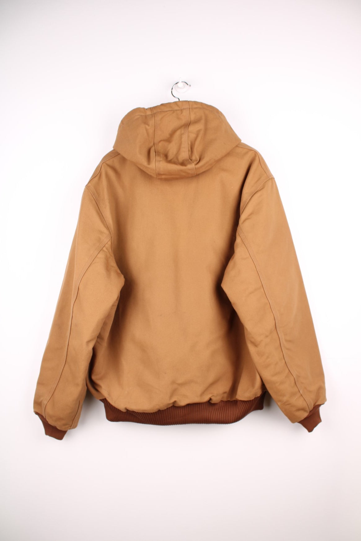 Carhartt Active Jacket in a tanned colourway, zips up and has side pockets, hooded and the embroidered on the front. 