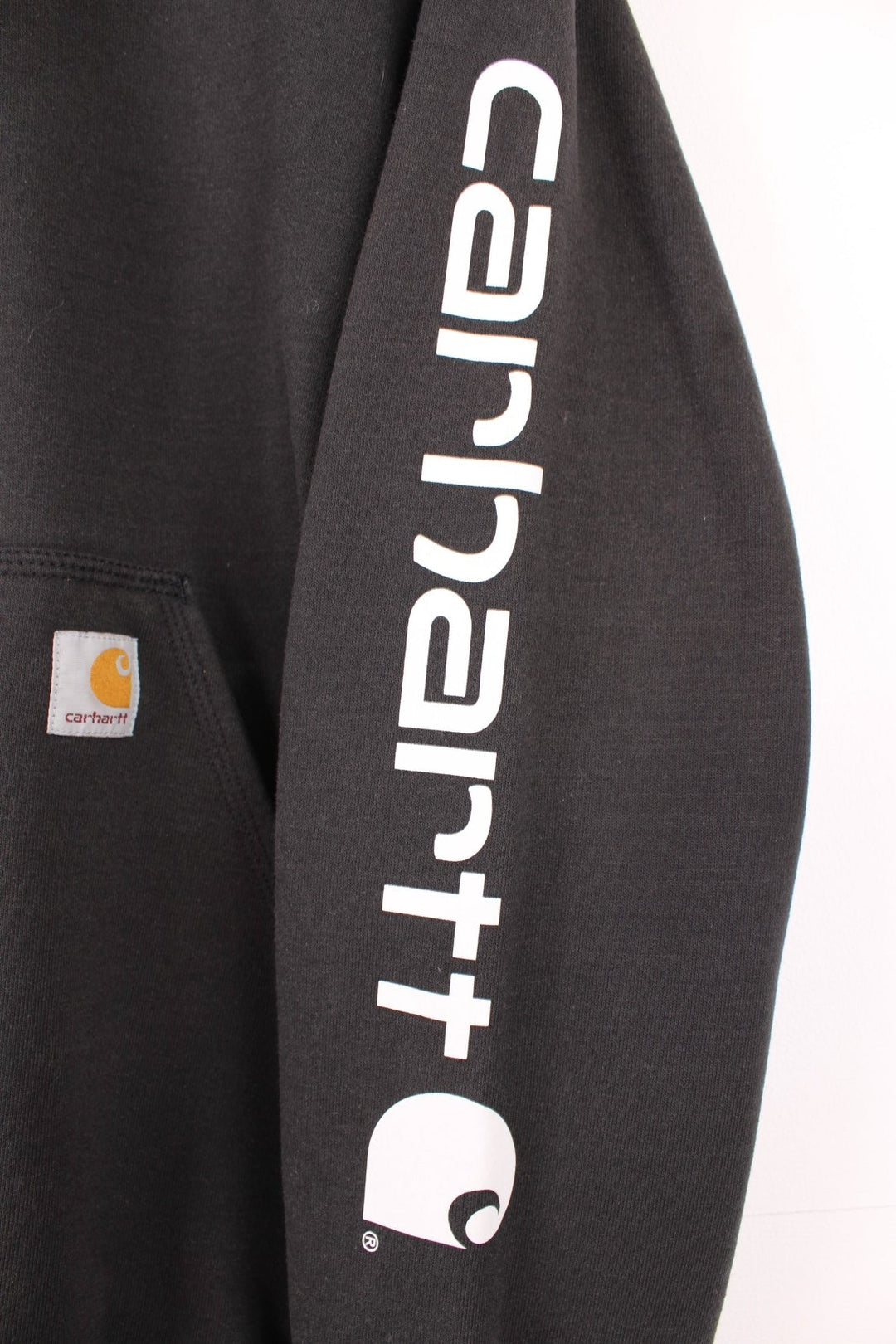 Carhartt 'Original Fit' all black hoodie, features spell-out details down the sleeve and embroidered logo on the pocket