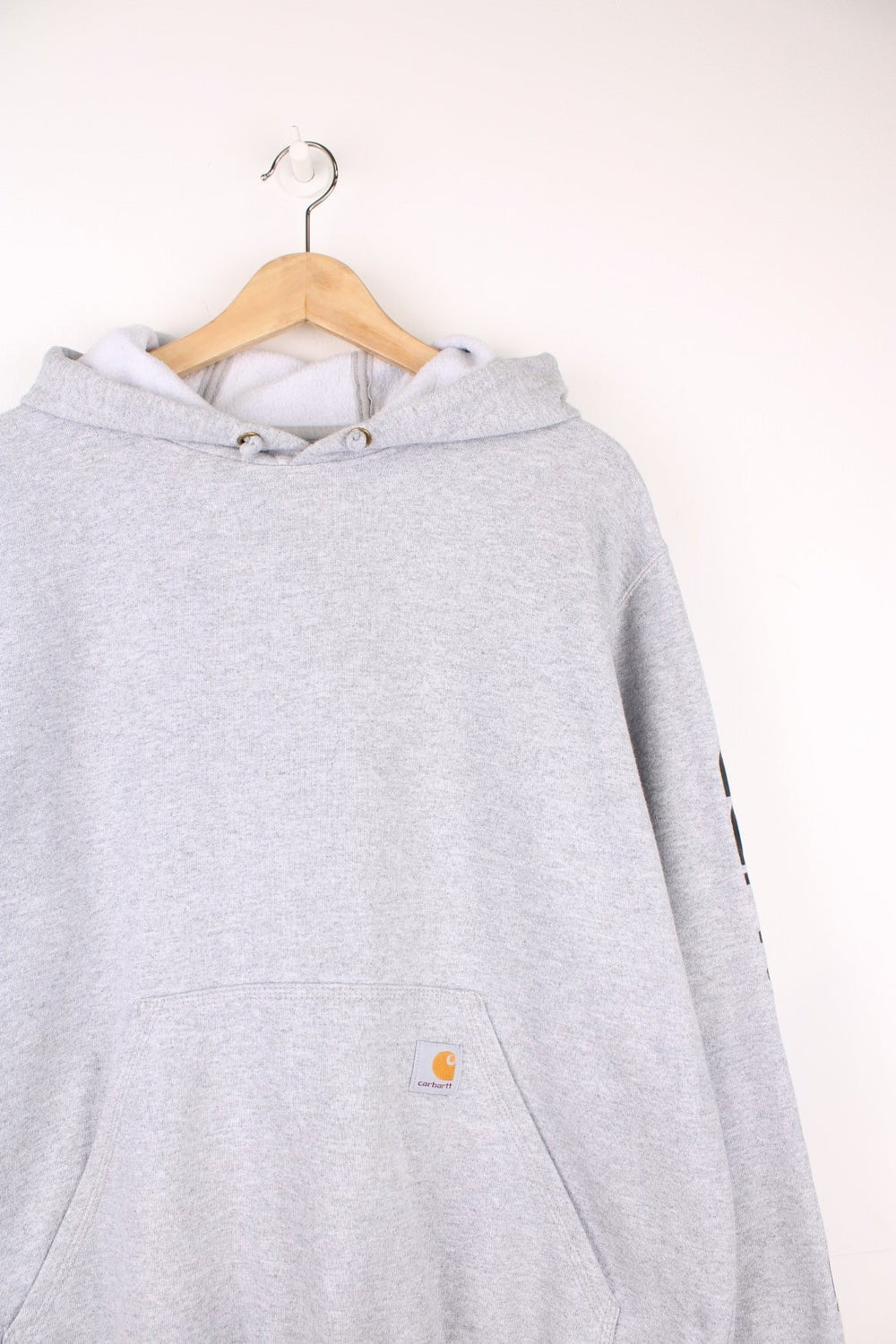 Carhartt light grey 'Loose Fit' hoodie, features spell-out details down the sleeve and embroidered logo on the pocket