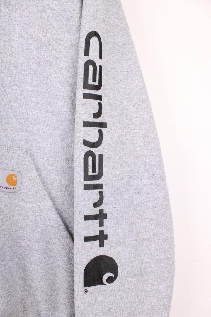 Carhartt light grey 'Loose Fit' hoodie, features spell-out details down the sleeve and embroidered logo on the pocket