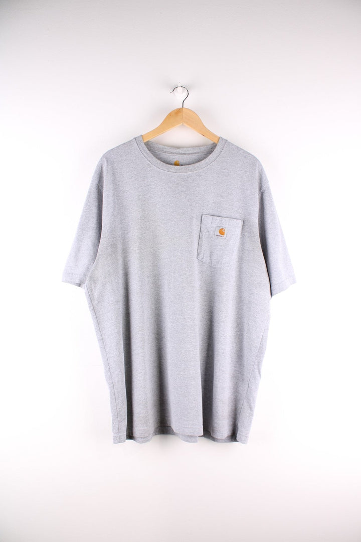 Carhartt T-Shirt in a grey colourway with a patch pocket and logo stitched onto the front.