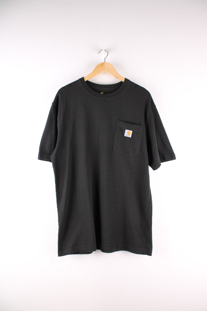 Carhartt T-Shirt in a black colourway with a patch pocket and logo embroidered on the front.