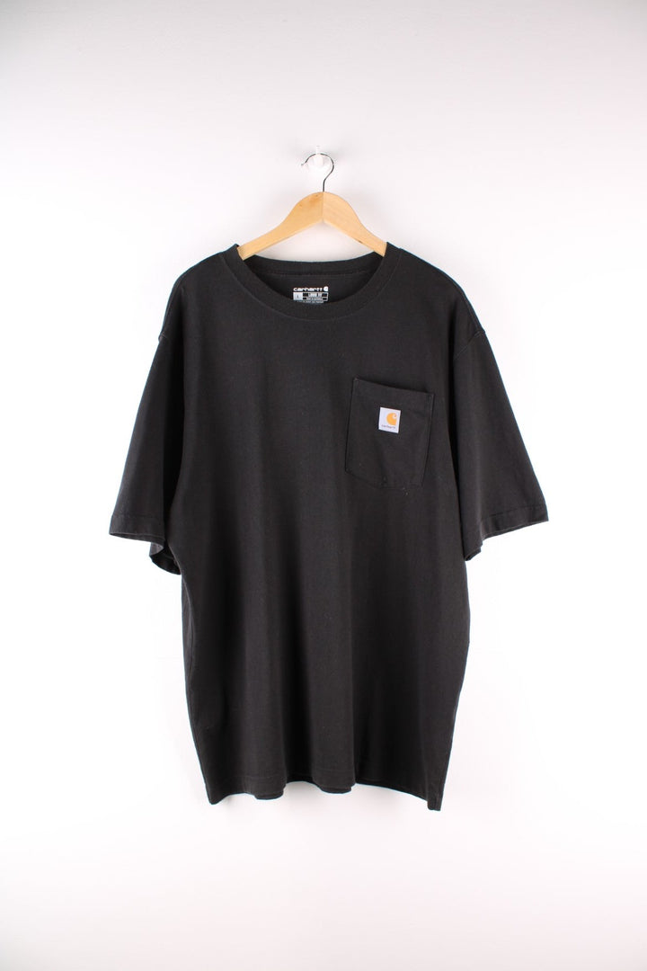 Carhartt T-Shirt in a black colourway with a patch pocket, and logo embroidered on the front