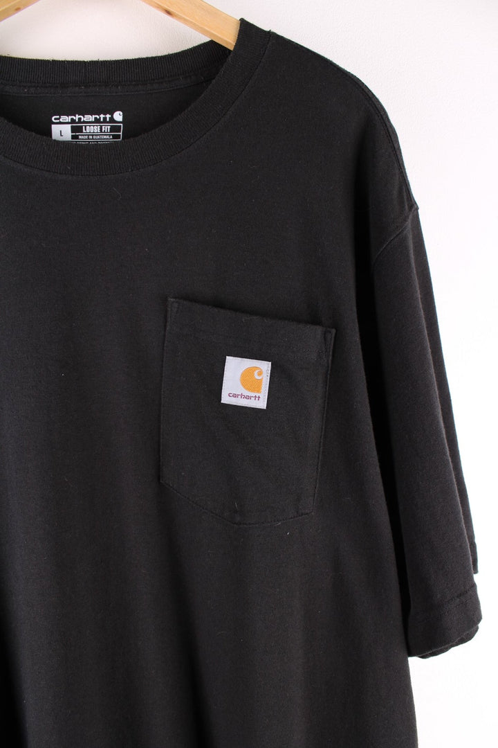 Carhartt T-Shirt in a black colourway with a patch pocket, and logo embroidered on the front