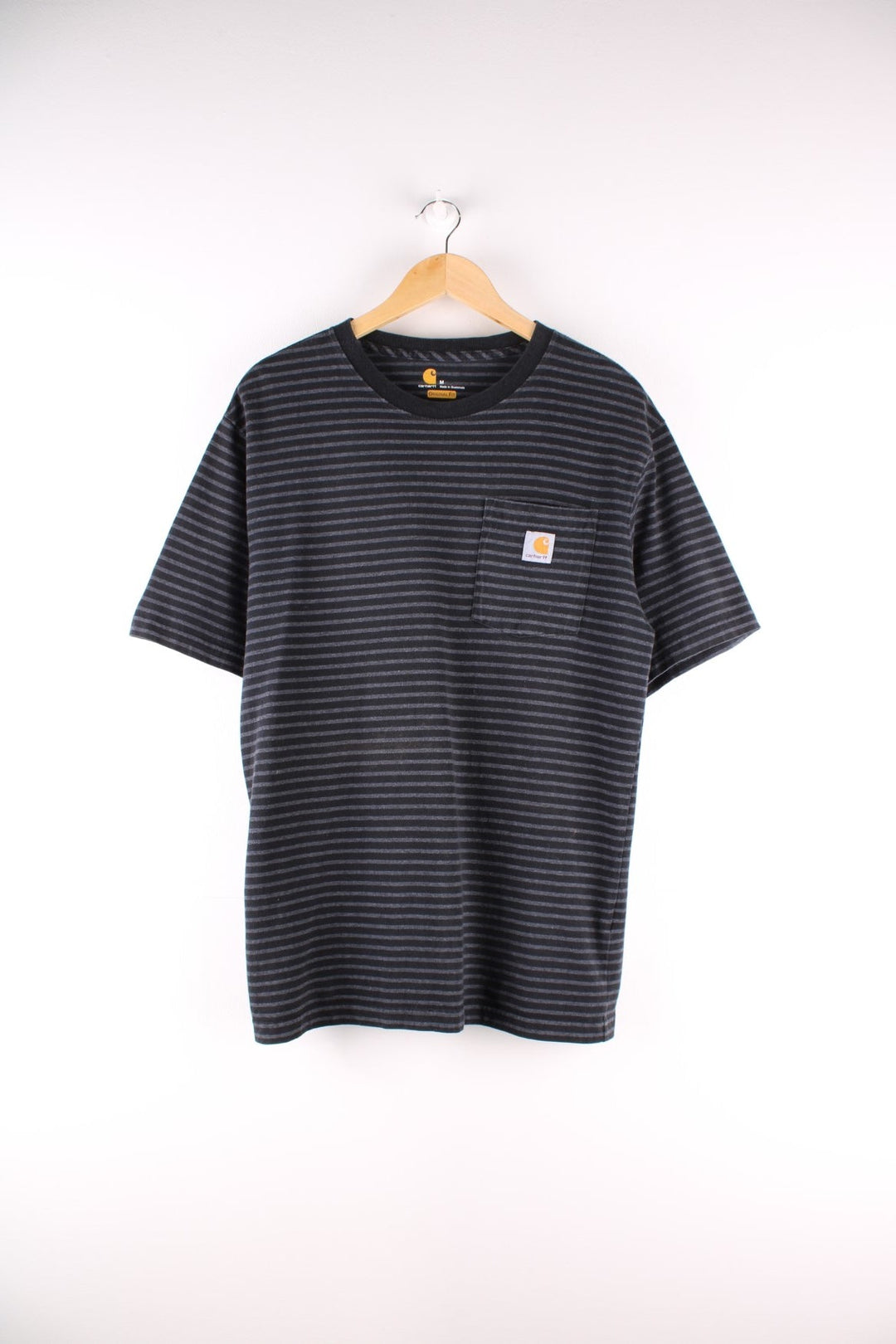 Carhartt T-Shirt in a grey and black striped colourway, with a patch pocket and logo embroidered on the front. 