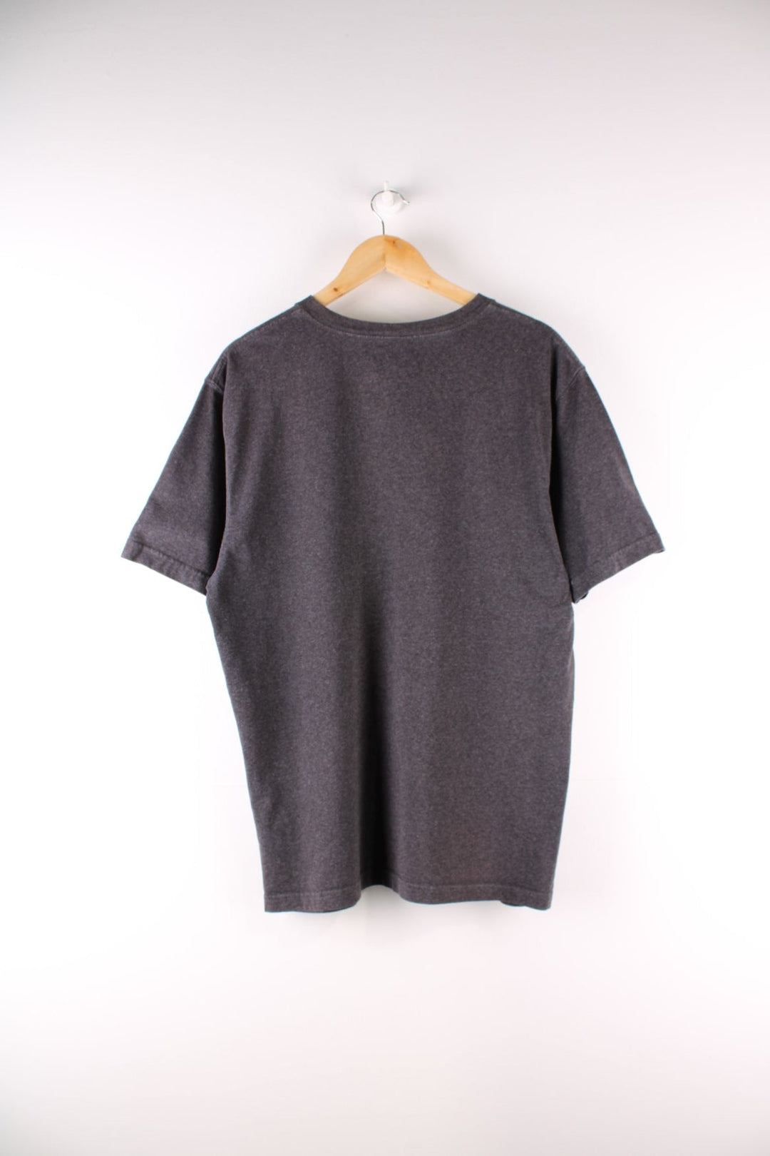 Carhartt T-Shirt in a dark grey colourway with a patch pocket and logo stitched onto the front.