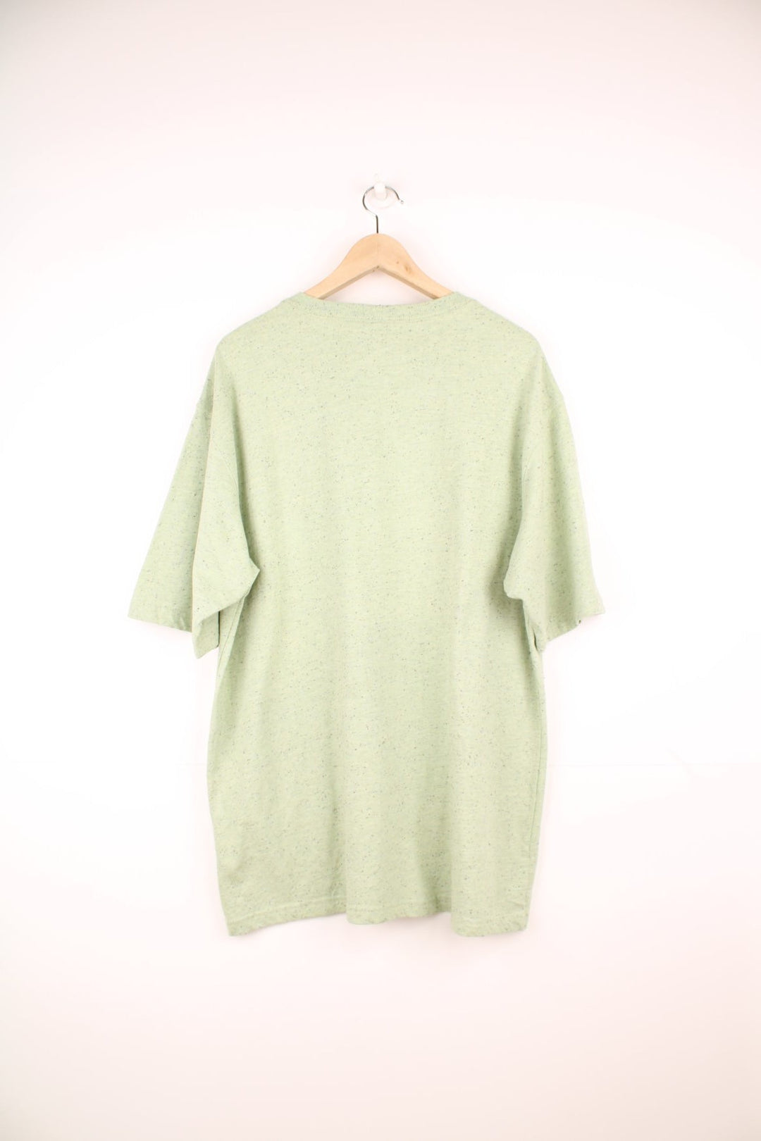 Green Carhartt Loose Fit T-Shirt featuring a chest pocket and embroidered logo.