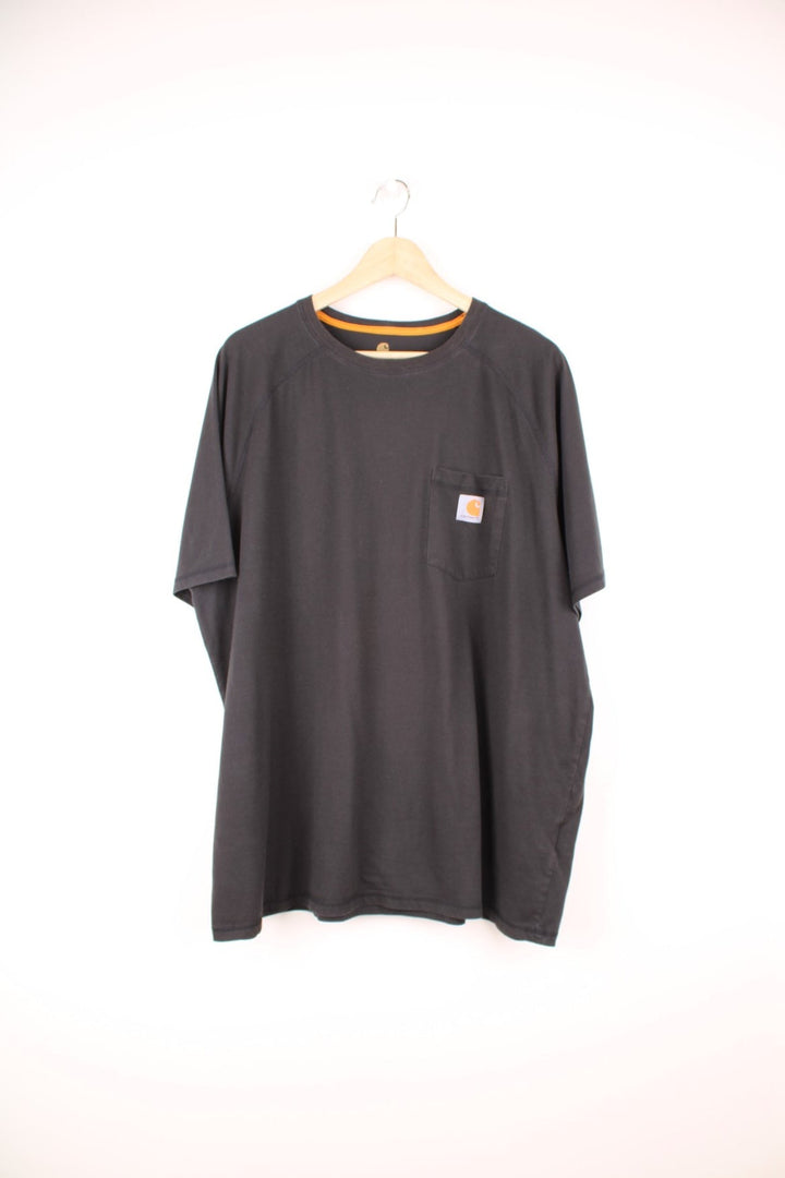 Carhartt Force, Relaxed Fit black T-Shirt with chest pocket and embroidered logo.