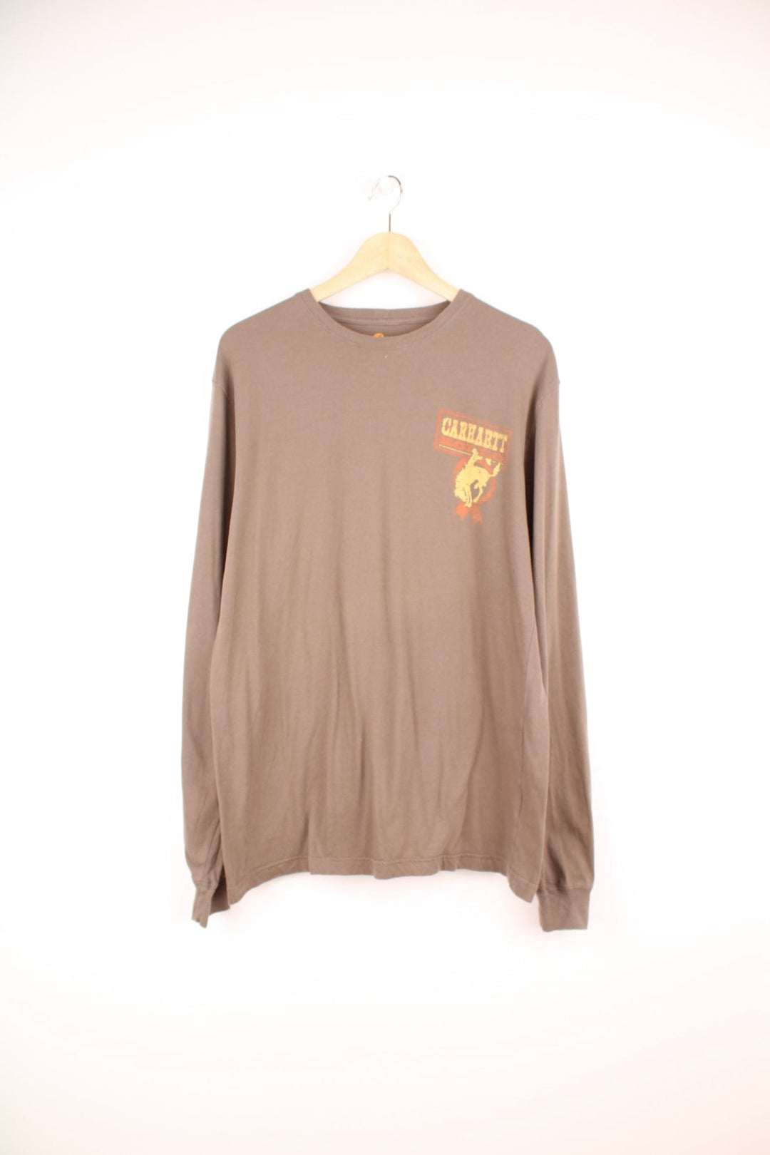 Carhartt Rodeo long sleeved top in brown, with graphic print on the chest and the back.