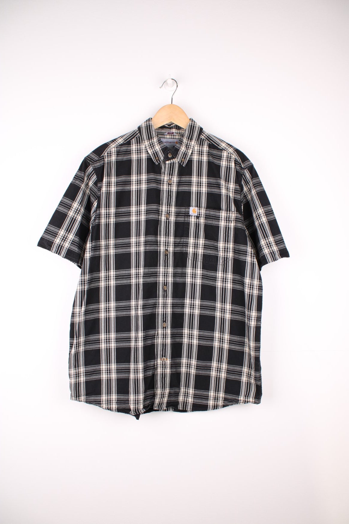 Carhartt relaxed fit short sleeved cotton shirt. Made from 100% cotton, features signature logo on the chest pocket