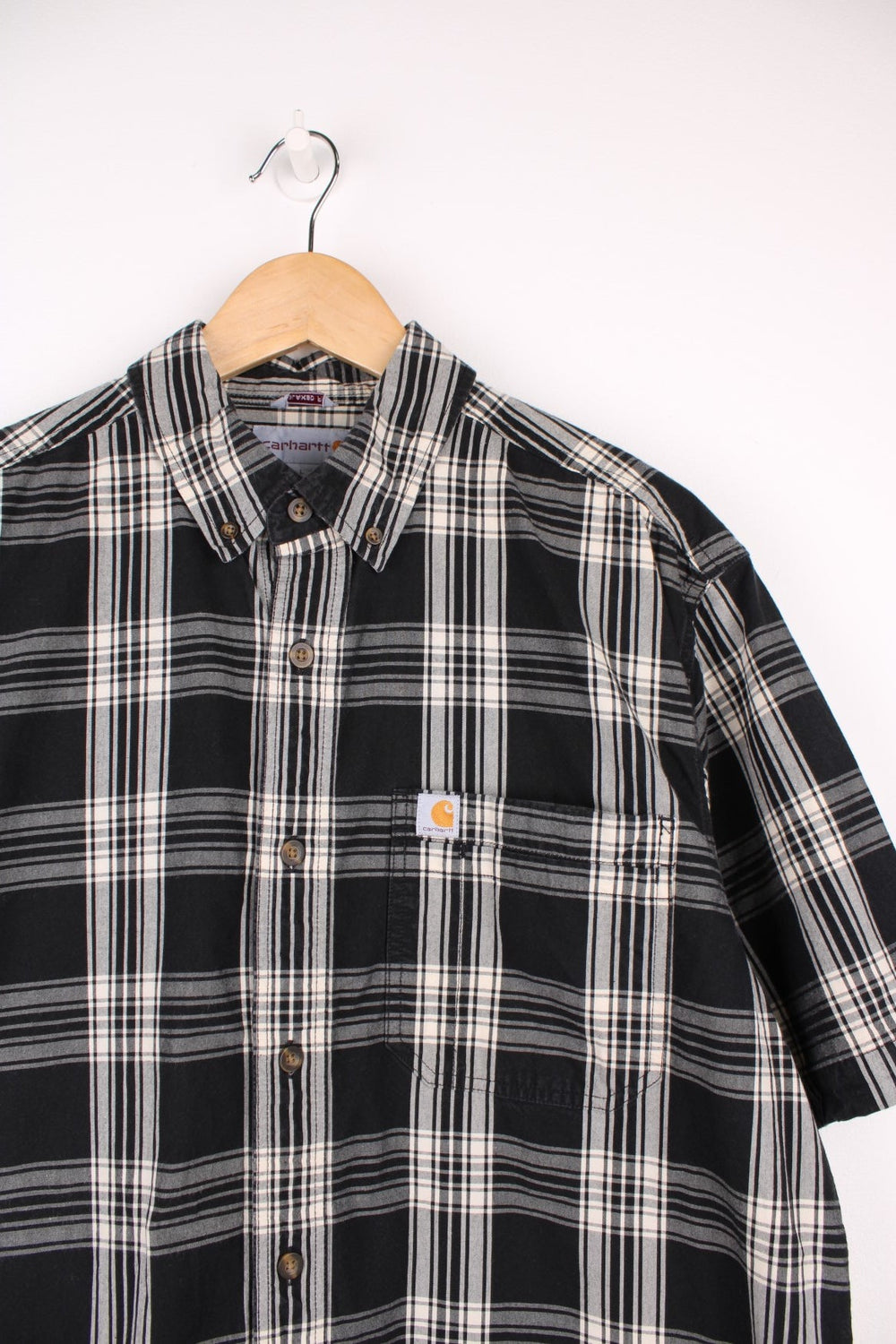 Carhartt relaxed fit short sleeved cotton shirt. Made from 100% cotton, features signature logo on the chest pocket