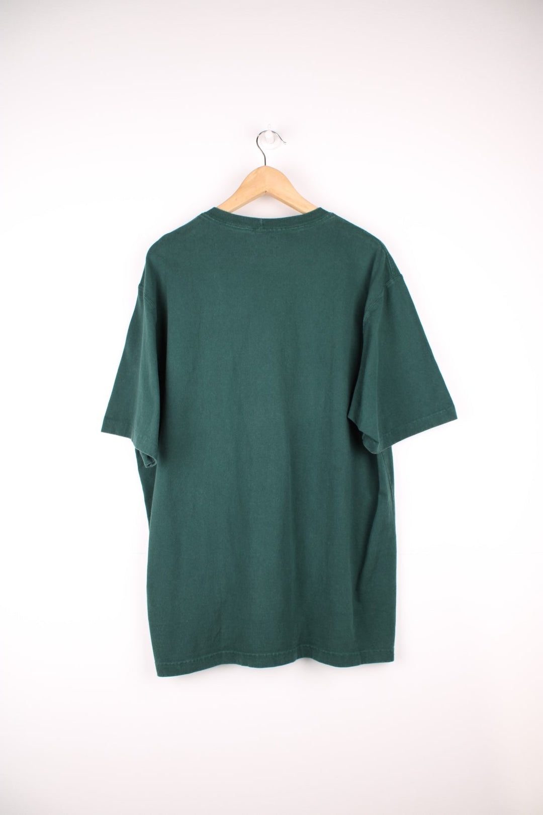 Carhartt green 'loose fit' t-shirt with chest pocket. Features signature logo on the pocket